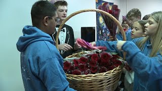 Oquirrh Hills Middle School students continue Valentine tradition of roses for every girl