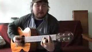 Richard Dawson sings and plays guitar