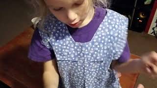 Rebekah paints with water.