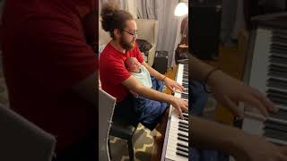 Aaron and daughter playing piano