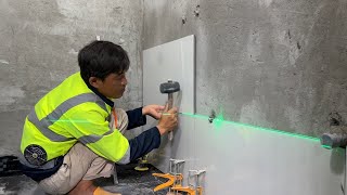 Installing Bathroom Wall Tiles: How Professionals Handle Pipes, Large Format Tile Bonding Technique