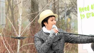 Arlene Paculan performing at the MCI News Conference