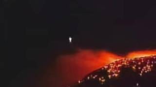 UFO coming out of Mount Etna... They glide through Lava like they do with water