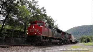 CSX Train No. K653 with CN Locomotive SD70M-2 No. 8803 & C44-9W No. 2640