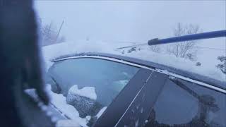 Cleaning Snow Off Car 2026