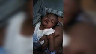 A 2MONTHS BABY SMILE WHILE SLEEPING