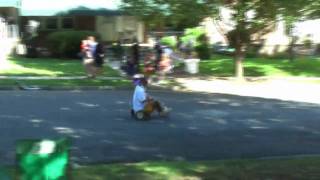 Anna eating dust in Loch Raven Village BigWheel Race