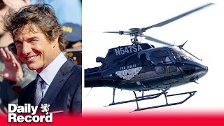 Tom Cruise lands helicopter at Top Gun sequel premiere