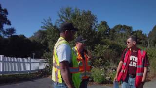Steve explaining how drone works to survey crew