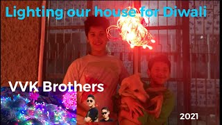Putting Lights Mala in our house for Diwali