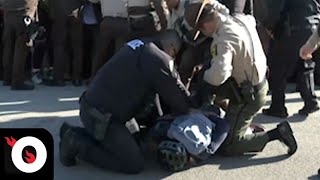 WATCH: Police Arrest Anti-ICE Protestors Outside Illinois Detention Facility