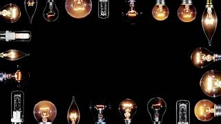 Many Edison lamps blinking over black, copyspace frame, looped video
