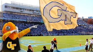 Georgia Tech's mascot Buzz celebrates a touchdown with the school flag in the end zone at UNC