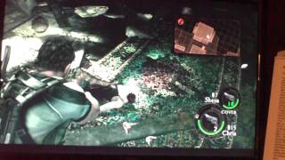 Resident Evil 5: Killing the lady with thing coming out of head(chopping DICK)