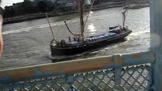 Boat is passing thru the tower bridge@London