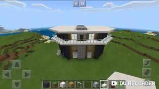 Mincraft slide show of a mansion