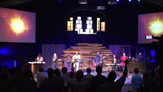 Pastor Mark Clarke leading worship. The song is called God’s Grace by Luther Barnes.