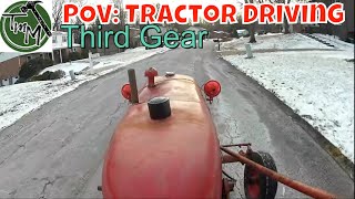 POV: Tractor Driving on the Road