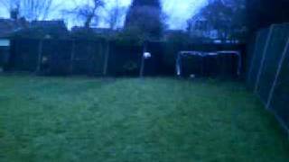 George playing football for fun