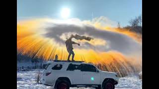 Hot water freezes before it hits the ground when released into the air in a very cold environment