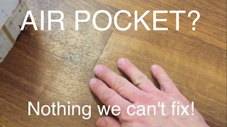 How to get rid of air pocket under vinyl linoleum