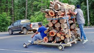 Driving an Overloaded Handmade Wooden Cart Through Traffic