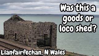 The crumbling railway building on the sea wall - Brundritt's Goods / Loco Shed Llanfairfechan
