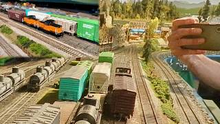 Part 129 - Two GE 44-tonners switch a single boxcar #hoscale #modelrailroad #switching #train #art