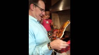 Aaliyah opens her birthday present with Papa