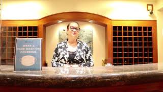 Sophie at the front desk of the Roger Smith Hotel