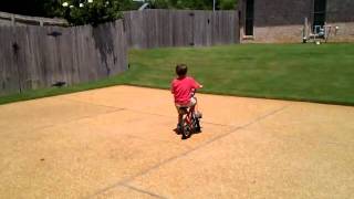 Clayton Page rides his bike