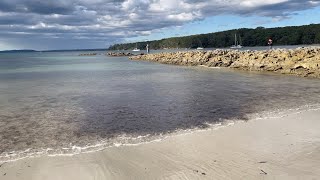 BEACH STROLL IN THE AFTERNOON AT SCOTTISH ROCKS BEACH BOODEREE NATIONAL PARK NEW SOUTH WALES
