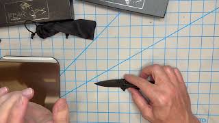 Bear Ops Rancor IV, nice knife but too smooth for it's own good.  And it's sad little brother.