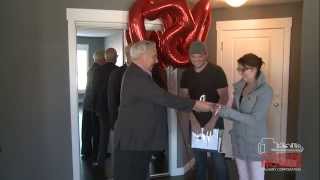 Councillor Stevenson, AHCC welcome 500th household into attainable home