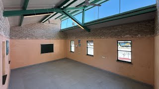 Low-carbon blocks made from sugarcane waste used to form classroom in India