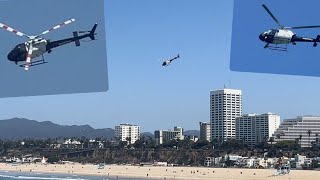 LAPD Helicopter flying low over Santa Monica beach