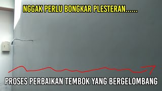 Proses perbaikan tembok yang bergelombang