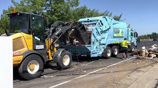 Garbage Truck Crushing  Roadside Waste by Sacramento Public Works Blue Truck and Cat Loader