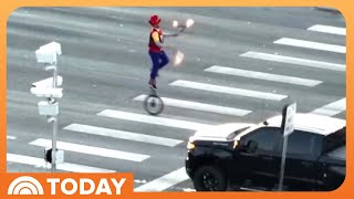 Fire-Juggling Unicyclist Performs Show at Colorado Intersection