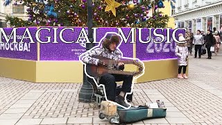 Old man playing AMAZING music with a SELF-MADE instrument