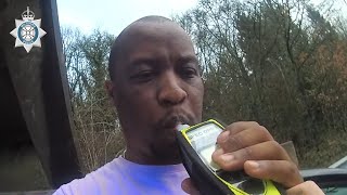 Drunk driver stops in live motorway lane and attempts breath test eight times