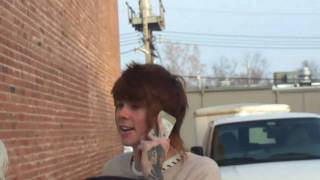 Christofer Drew talking on the phone