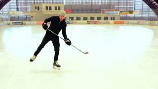 Backward Skating Drill: Backward Continuous Crossovers with a Slap Shot