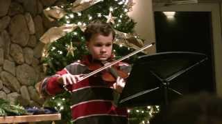 Alec playing violin at Christmas