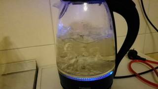 Slow motion - Boiling a 1.6 litre of water in a glass kettle