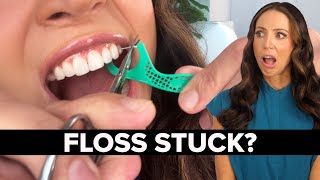 Floss Stuck Between Teeth? Here’s What to Do!