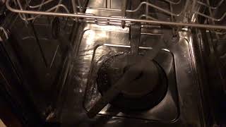 Broken LG dishwasher interior view