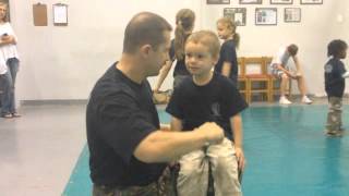 Four year old Systema student breathing and taking strikes.