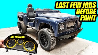 Test fitting a new grille, bumper, steering guard and painted dials on the Land Rover Defender