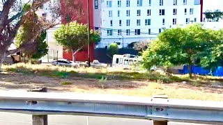 HOLLYWOOD FREEWAY HOMELESS RV CAMPERS GRAFFITI THE NEW AND IMPROVED LA LOS ANGELES PARDON THE GLARE!